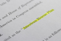 Closeup of the documents of the American Rescue Plan Act of 2021, an economic stimulus package proposed to speed up the recovery from the economic and health effects of the pandemic and the recession.