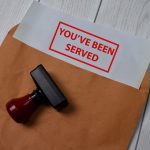 Red Handle Rubber Stamper and You've Been Served text isolated o Red Handle Rubber Stamper and You've Been Served text isolated o